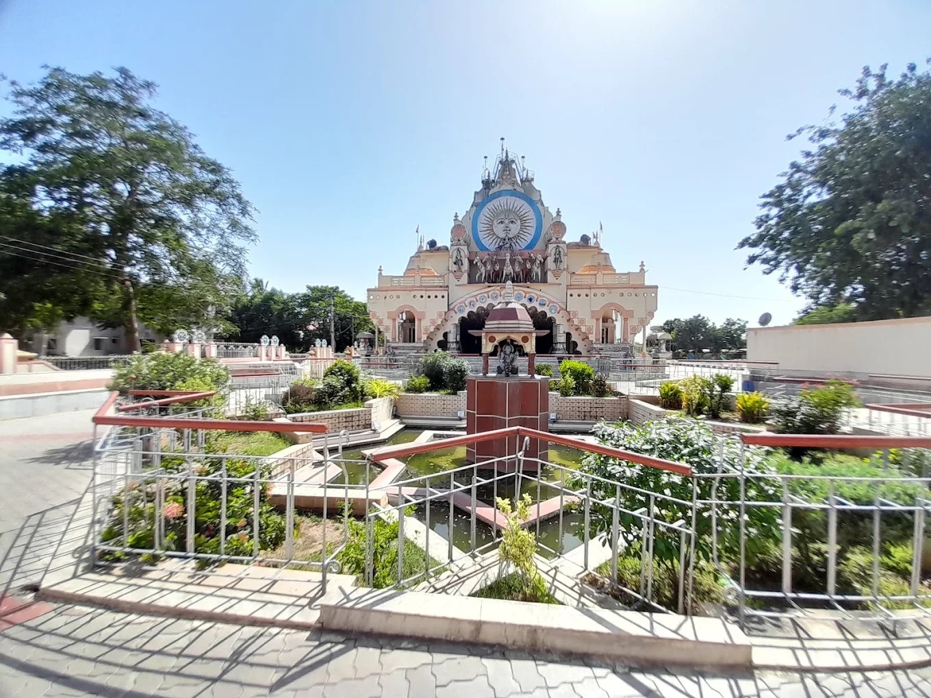 Surya Mandir Borsad grounds with garden and fountain, wide view